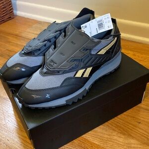 Men’s size 11 DC Batman running shoes - made by Reebok.  Collectors edition!